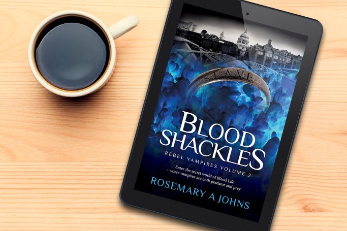 blood-shackles-on-tablet-by-coffee